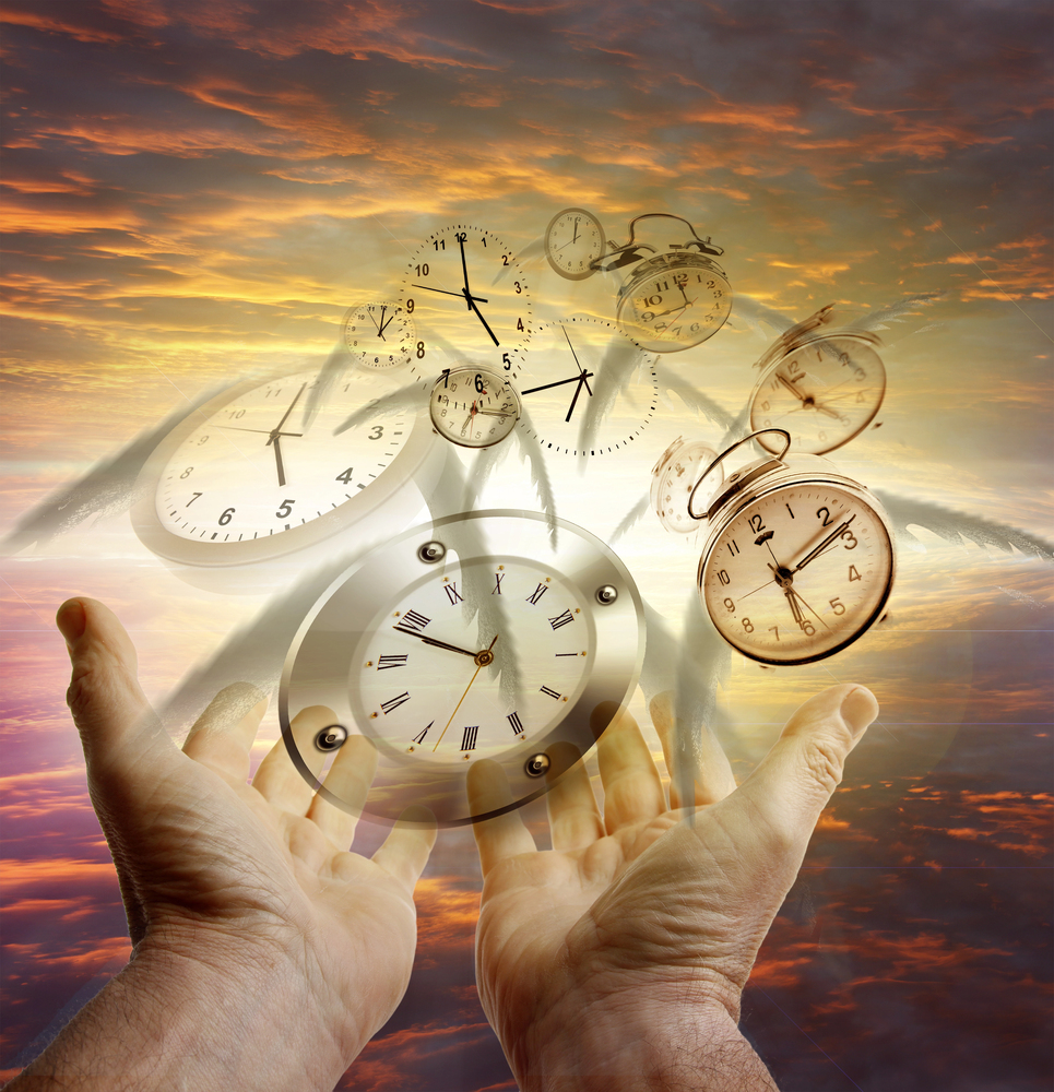 Depositphotos_58030385_S - Renuevo De Plenitud Hands cupping multiple clocks floating in a sunset sky, symbolizing time.